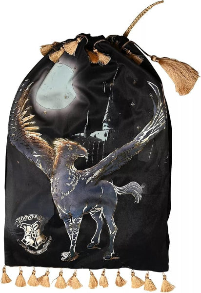 Black drawstring bag with a unicorn design and gold tassels on a white background