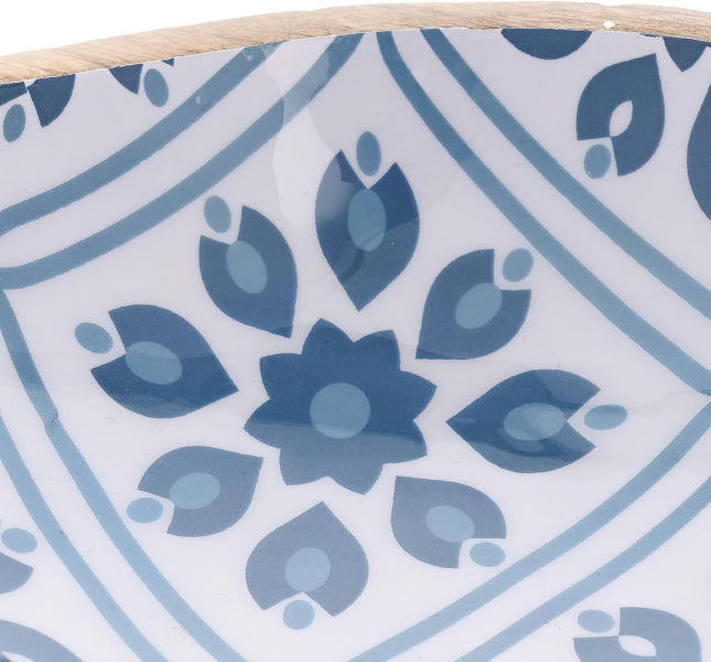 Decorative plate with blue floral pattern on a white background