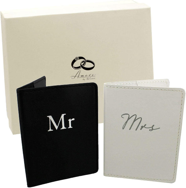 Black 'Mr' wallet and white 'Mrs' wallet with a beige box featuring a ring design.