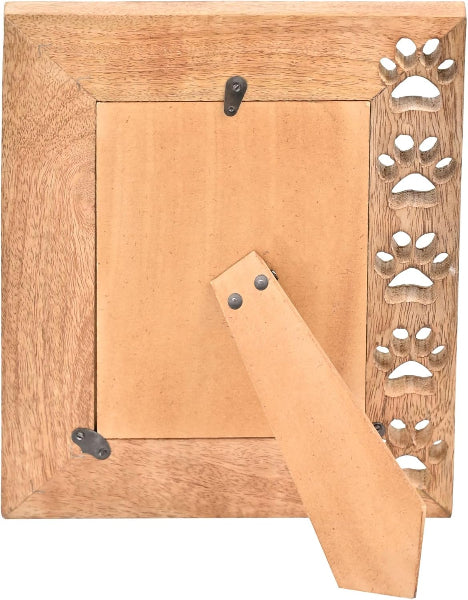 Wooden picture frame with decorative cut-out design on a white background