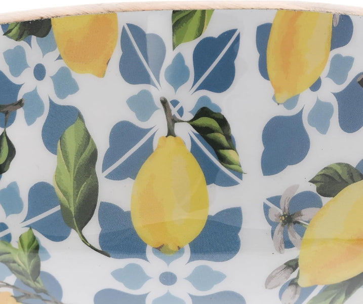 Patterned fabric with lemons, leaves, and flowers on a blue and white background