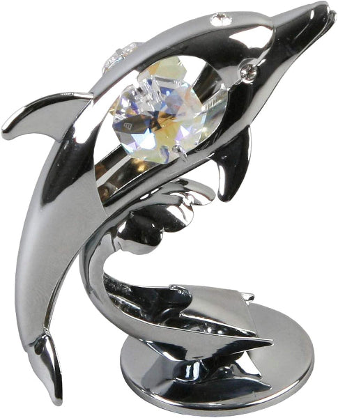 Chrome dolphin figurine with a clear gemstone on a white background