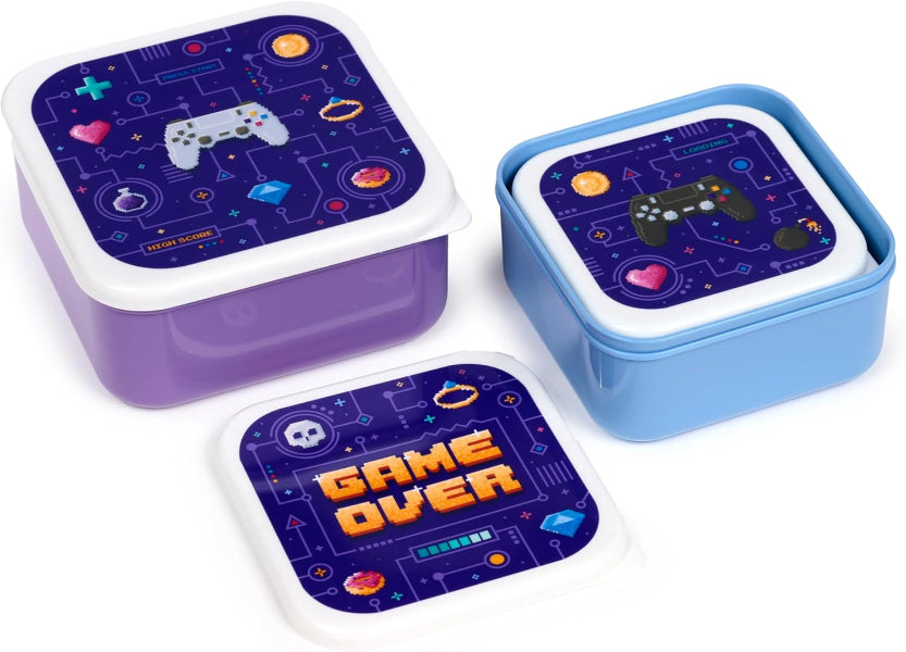 Three lunch boxes with gaming-themed designs on a white background