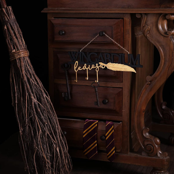 Wooden sign with 'Winkelhaken' and a broom in front of a wooden cabinet.
