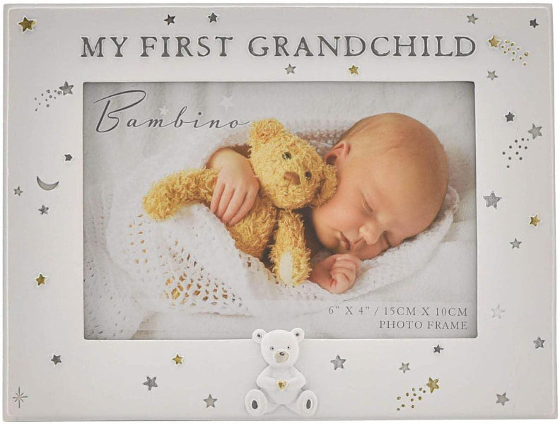 Photo frame with text 'My First Grandchild' and a baby holding a teddy bear.