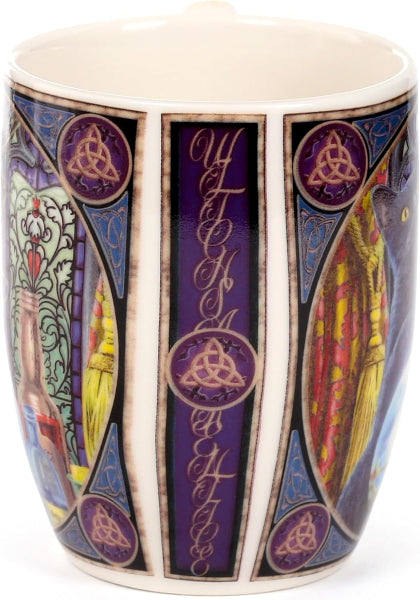 Decorative mug with colorful designs and text on a white background