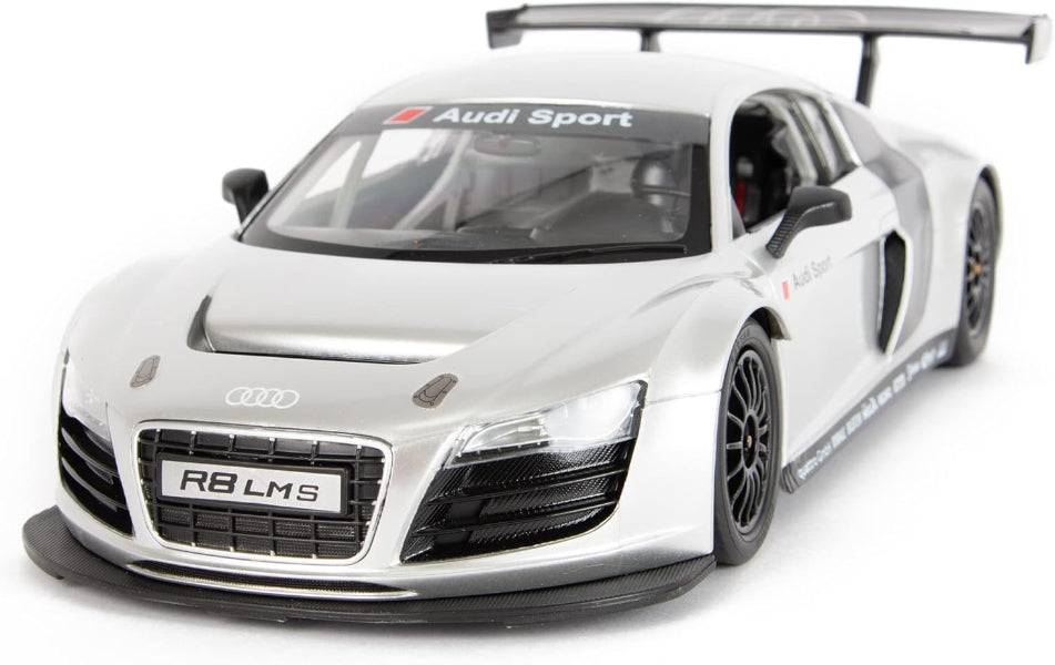 Model of a silver Audi car with 'Audi Sport' branding on a white background
