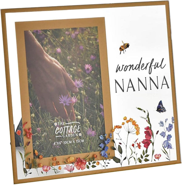 Framed photo of a hand holding flowers with 'wonderful NANNNA' text and floral design.