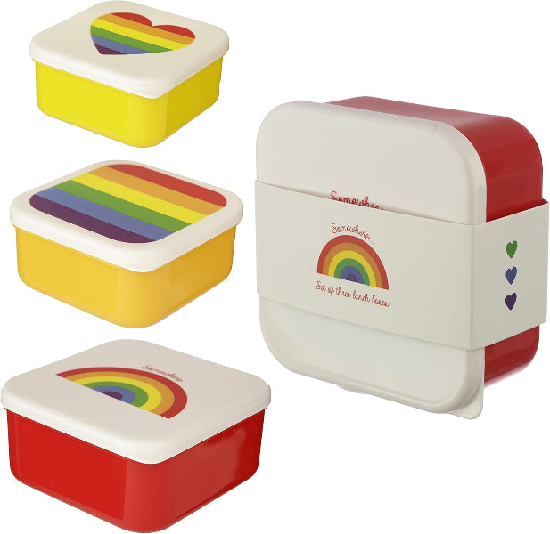Set of colorful lunch boxes with rainbow designs on a white background