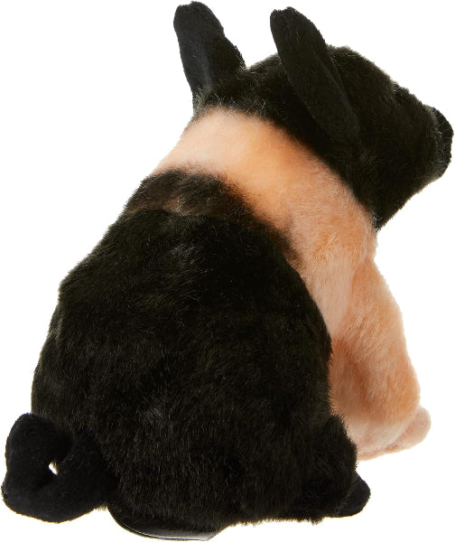 Plush toy resembling a cat with black and orange fur on a white background