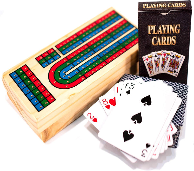 Wooden cribbage board with playing cards on a white background