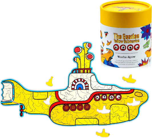Yellow submarine puzzle with packaging featuring The Beatles' Yellow Submarine design.