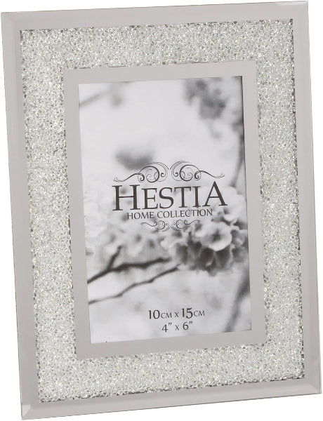 Silver glitter photo frame with 'Hestia Home Collection' branding