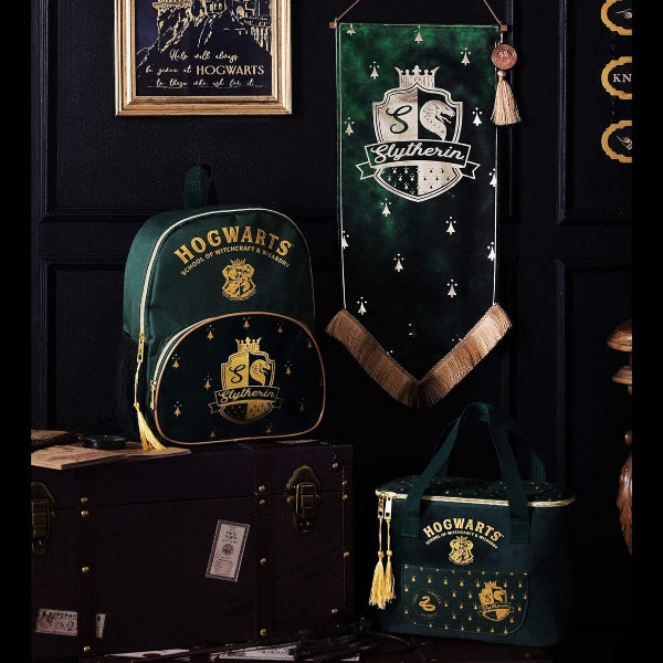 Hogwarts-themed backpack, bag, and banner on a dark background