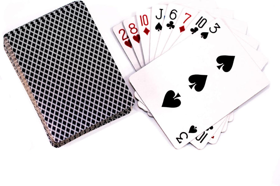 Black and white checkered playing card case with cards fanned out on a white background