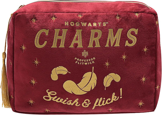 Red bag with gold text and designs, featuring the word 'Charms' and a tassel.