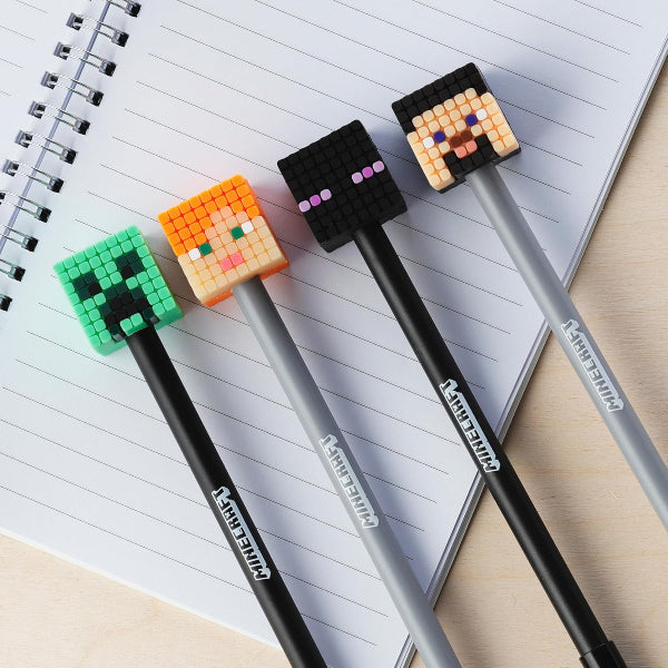 Four pixelated character pens on a notebook with 'MINECRAFT' branding.