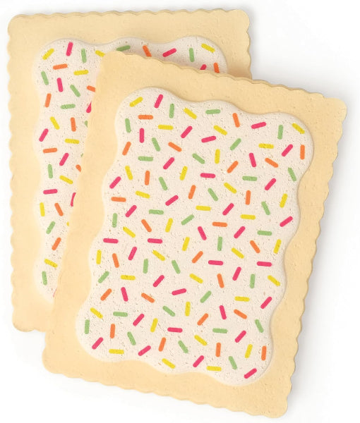 Two toy cookies with colorful sprinkles on a white background