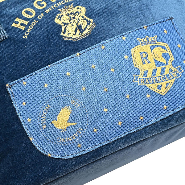 Blue fabric with embroidered Hogwarts and Ravenclaw logos