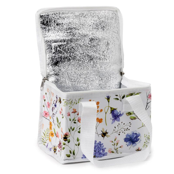 Floral-patterned cooler bag with silver interior on a white background