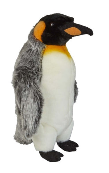 A plush toy penguin standing upright against a plain white background. The toy has a white belly, gray back and wings, a black head and feet, and orange accents around the beak and neck.