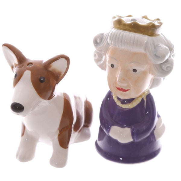 Ceramic salt and pepper shakers shaped like a dog and a person with a crown on a white background