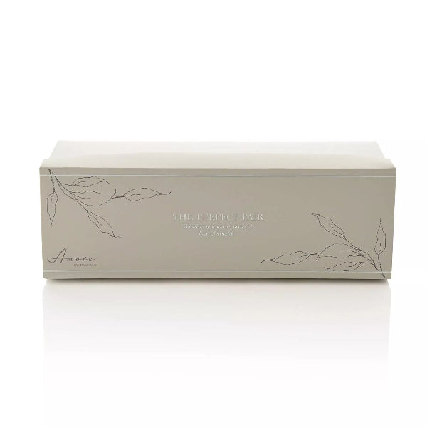 Beige eyewear box with 'The Perfect Pair' text and leaf designs on a white background