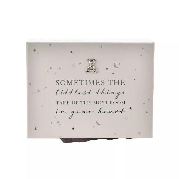 Decorative box with teddy bear and quote on a light background