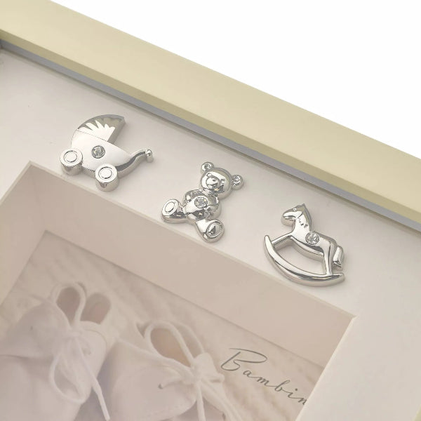 Silver baby-themed charms in a decorative box with 'Bambino' text.