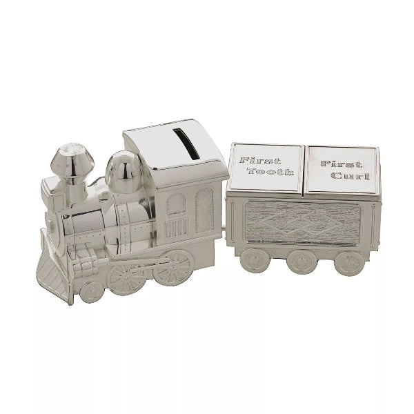 Silver train-shaped money box with compartments labeled 'First Tooth' and 'First Curl' on a white background.