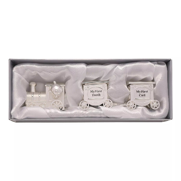 Silver train set with 'My First Tooth' and 'My First Curl' cars in a box.
