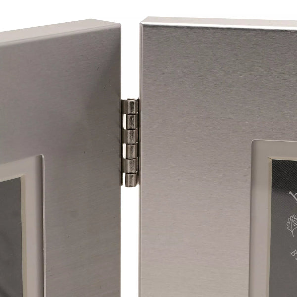 Metallic photo frame with a hinge on a white background
