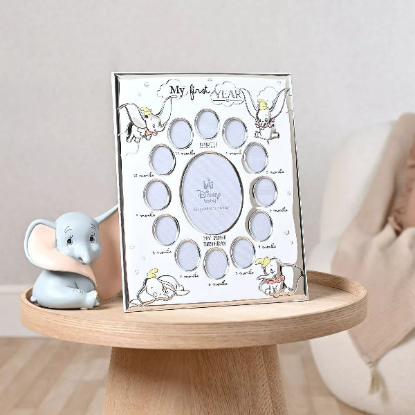 Baby milestone frame with cartoon characters on a wooden tray