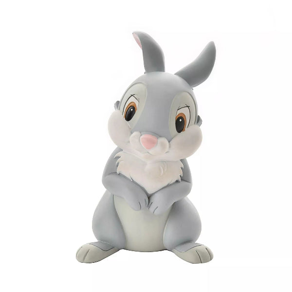 Plush toy of a cartoon character with gray fur and white belly on a white background