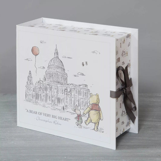 Card with illustrations of a bear and a rabbit, featuring St. Paul's Cathedral, on a gray background.
