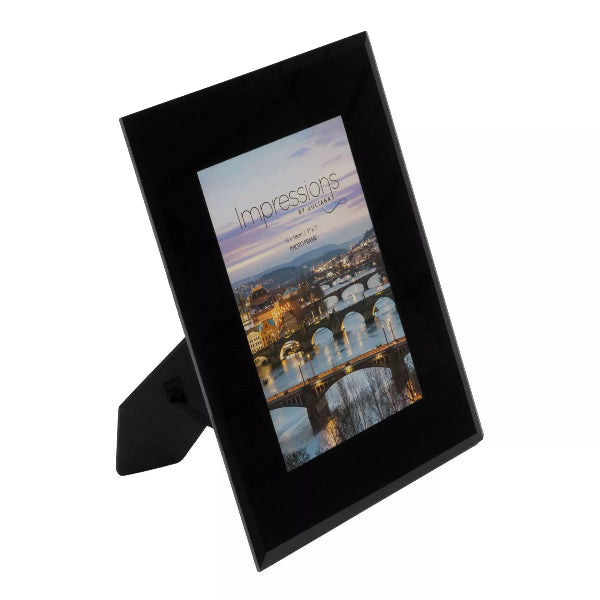 Black photo frame with a scenic image on a white background