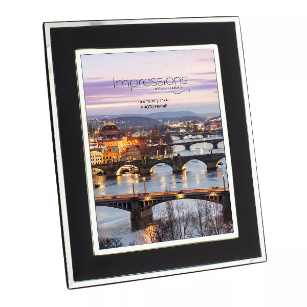 Black photo frame with a scenic cityscape print on a white background
