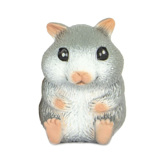 Small figurine of a gray hamster with black eyes on a white background