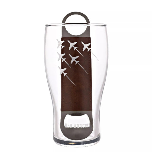 Clear glass with brown leather pull tab and airplane design on a white background