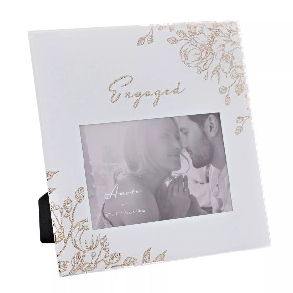 Photo frame with 'Engaged' text and floral design on a white background