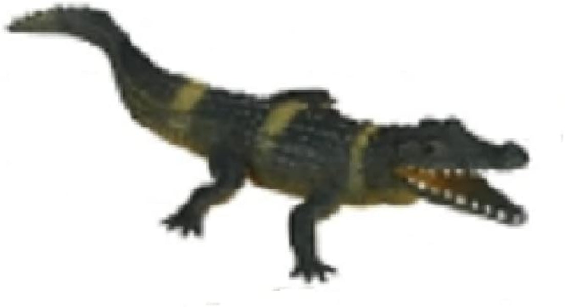 Toy alligator on a white background