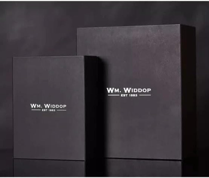 Two black boxes with 'W. M. Widdop' branding on a dark background