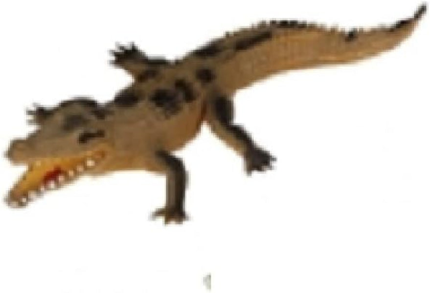 Toy crocodile on a white background