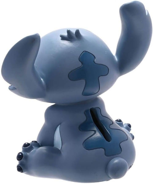 Blue cartoon character figurine on a white background
