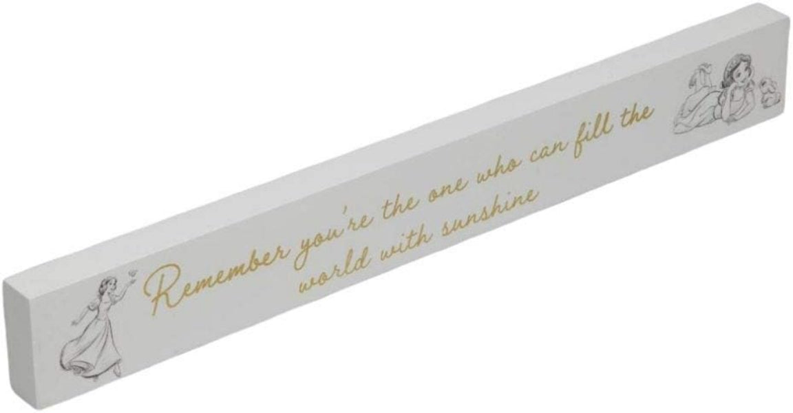 Decorative wooden block with motivational quote and illustrations on a white background
