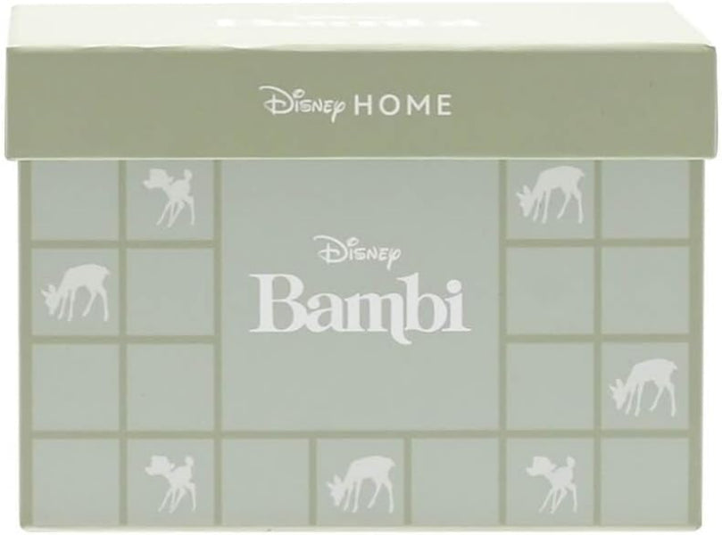 Disney Home Bambi themed product packaging with deer illustrations on a light green background.