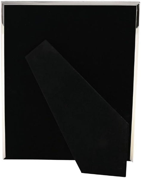 Black book with a silver cover on a white background