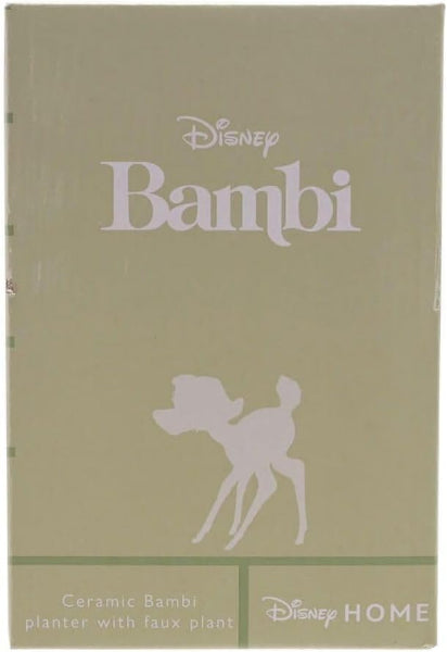 Disney Bambi ceramic planter with faux plant packaging on a beige background