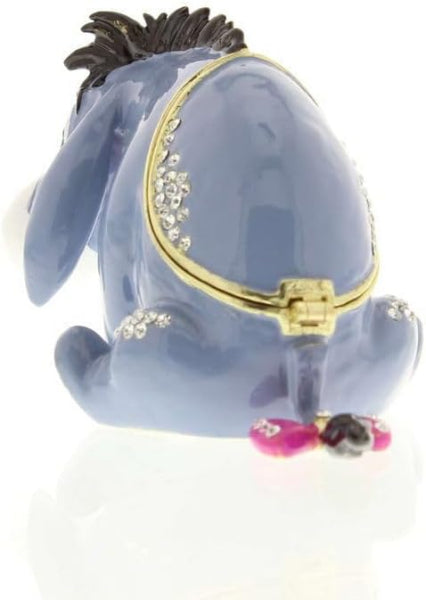 Decorative figurine of a donkey with decorative elements on a white background