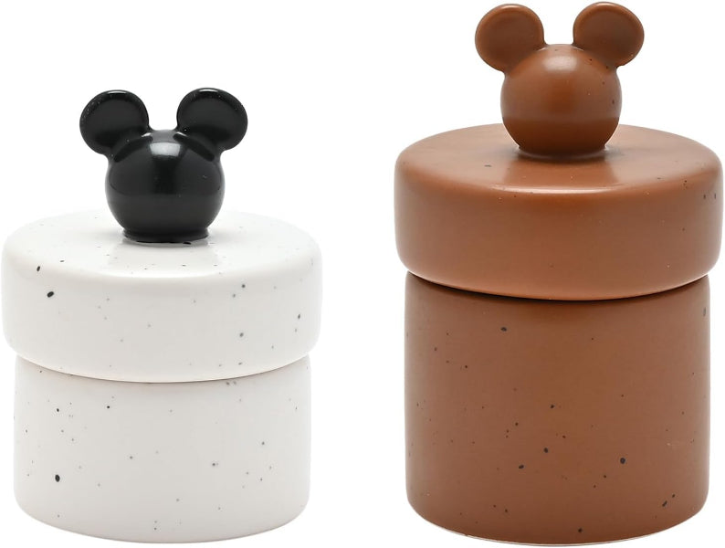 Two ceramic containers with mouse ear designs on a white background